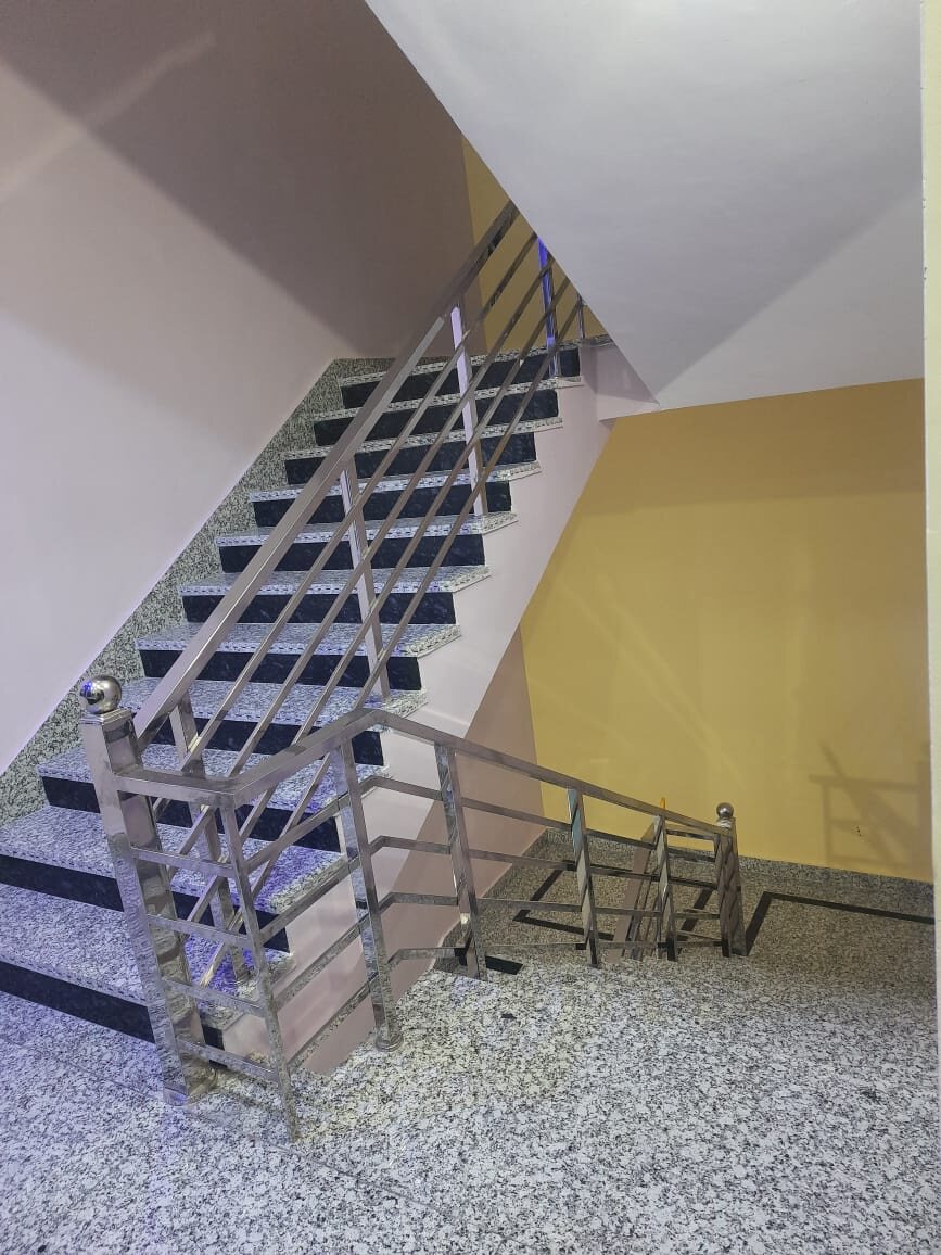Clean guest house corridor and stairs